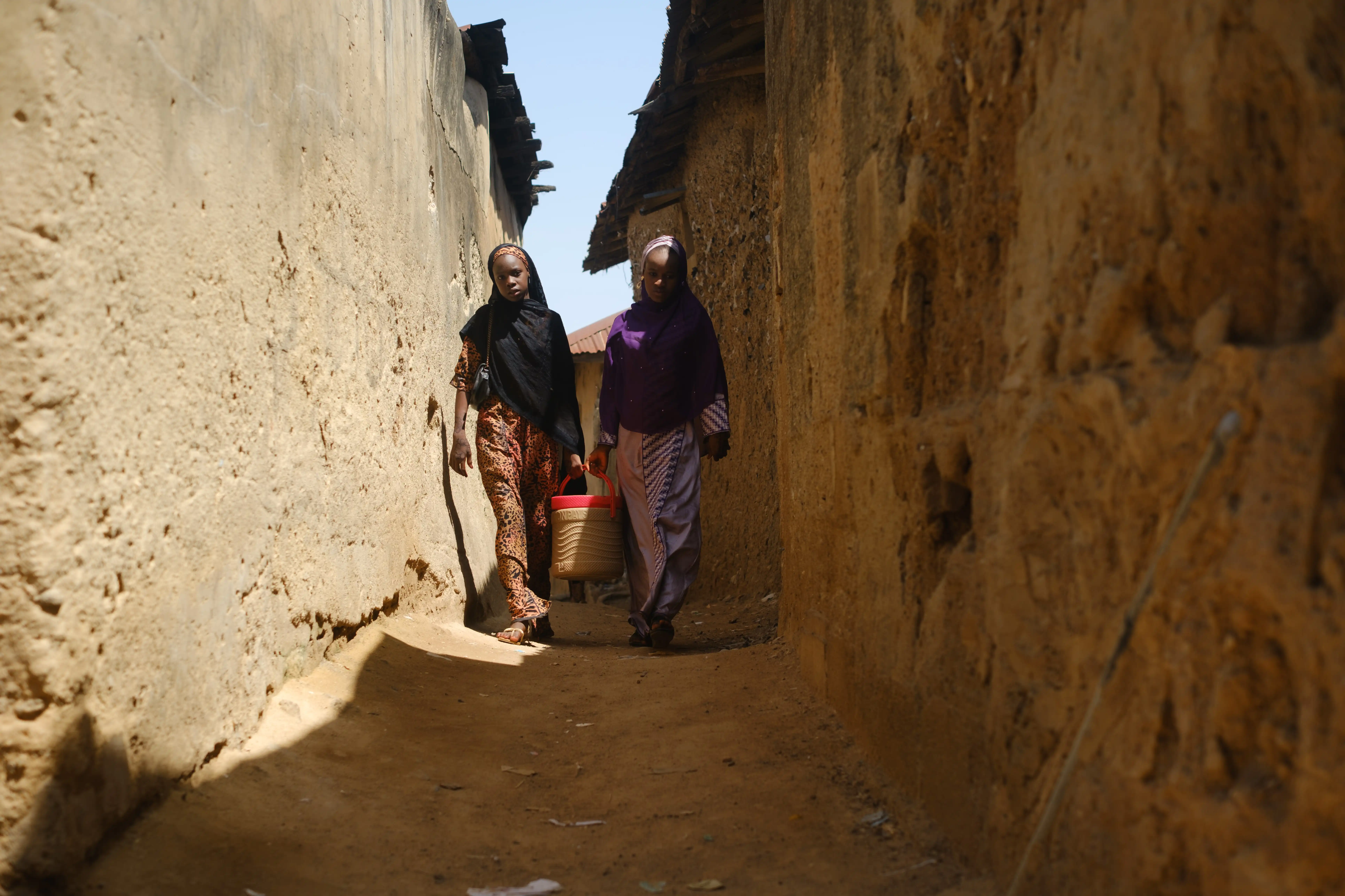 Durbar drummers performing in colorful traditional attire