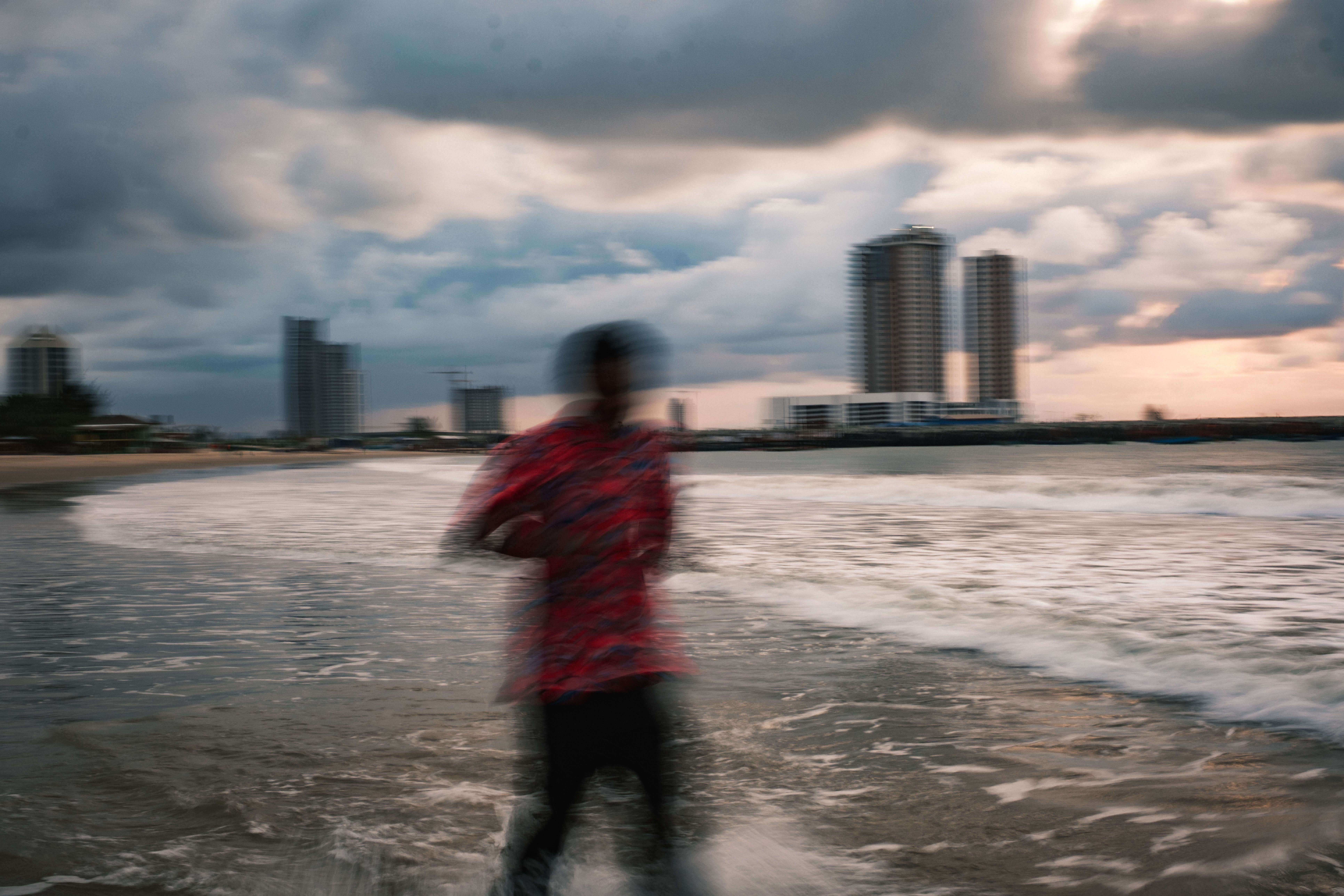 Sunrise washing over Tarkwa Beach shoreline in Lagos